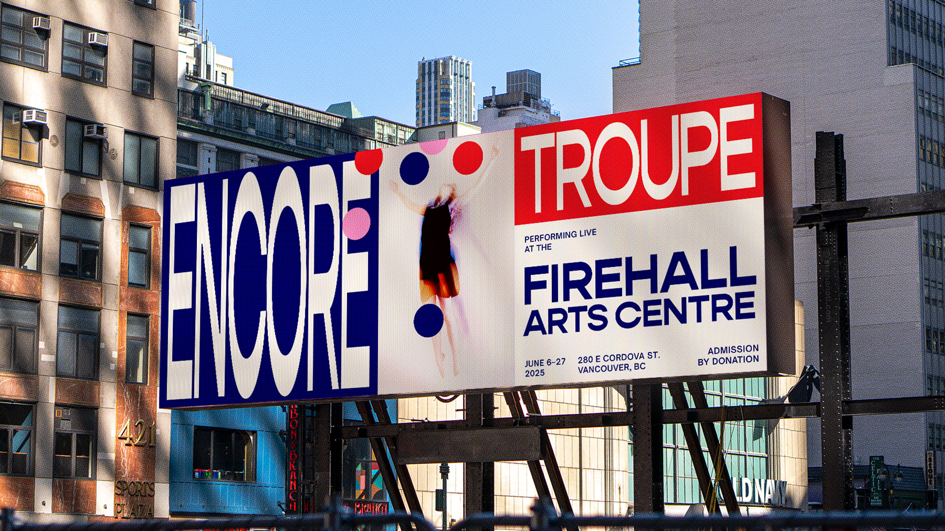 A billboard (OOH) ad in a city environment with bold, compressed type promotes Encore, a Troupe performance at the Firehall Arts Centre.